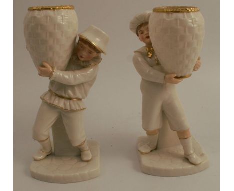 Two 19th century Royal Worcester figures, of boys carrying baskets, in white with gilt highlights, dated 1881, height 7.75ins