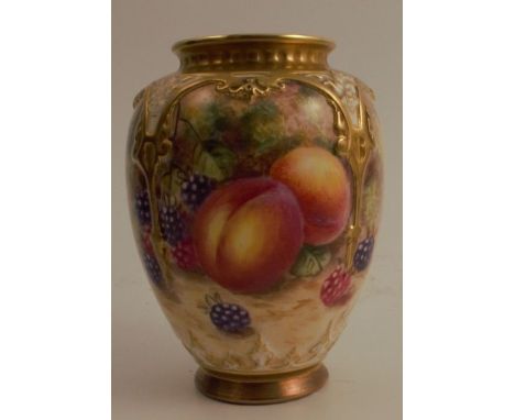 A Royal Worcester quarter lobbed vase, decorated to the front with fruit to a mossy background by Freeman, shape number H169,