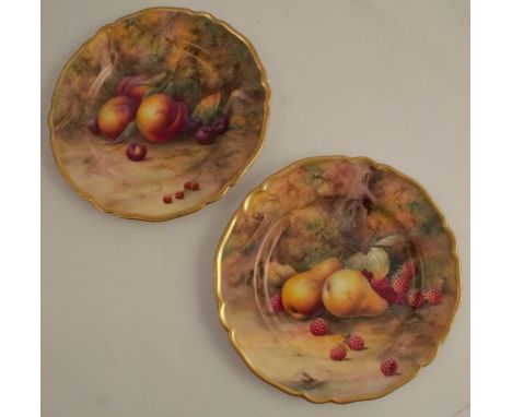 Two Royal Worcester cabinet plates, decorated with fruit to a mossy background by H H Price, both af, diameter 9ins, hairline