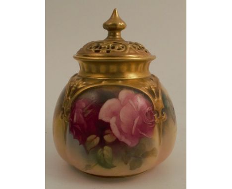 A Royal Worcester covered vase, with pierced gilt cover, the quarter lobed body decorated with roses, shape number H175, heig