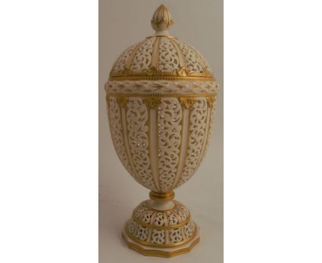 A Grainger & Co Worcester reticulated ivory covered vase, attributed to George Owen, with pierced panels to the cover, body a