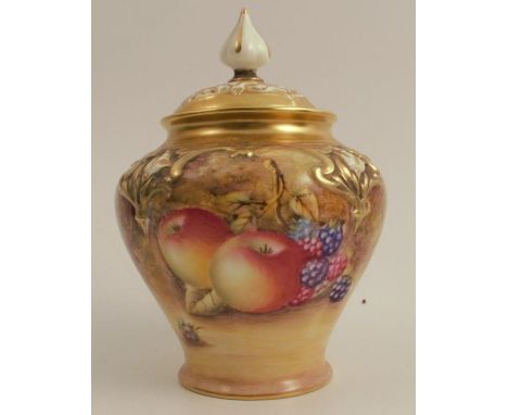 A Royal Worcester covered vase, decorated all around with fruit to a mossy background, signed, shape number H279, height 5.5i