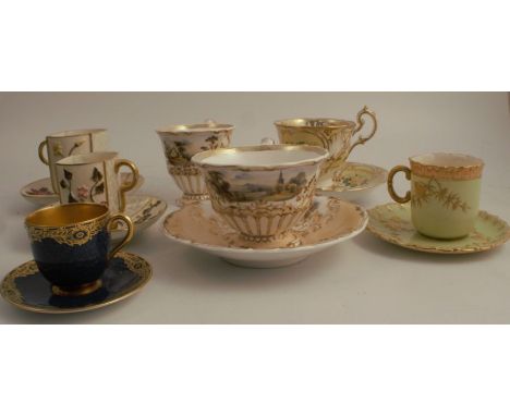 A Royal Worcester Japonesque tea cup and saucer, decorated with flowers and moulded foliage, together with a similar smaller 