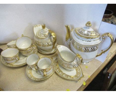 A Flight Barr and Barr part tea service, comprising tea pot, coffee pot, stand, milk jug, four tea cups, two coffee cans, two