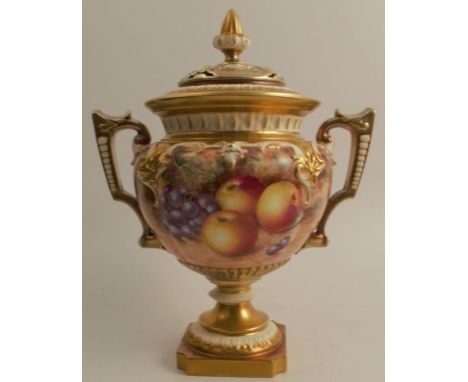 A Royal Worcester covered vase, decorated all around with hand painted fruit by Freeman, raised on a rebated square plinth, s