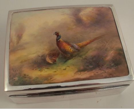 A hallmarked silver cigarette box, inset with a rectangular porcelain plaque, probably Royal Worcester, decorated with pheasa