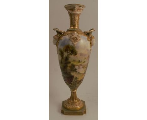 A Royal Worcester pedestal vase, the front decorated with a landscape by F Roberts, the back with a smaller landscape, having