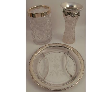 A cut glass vase, with silver mount decorated with swags, stamped 1914 Sterling Silver, height 9ins, together with a cylindri