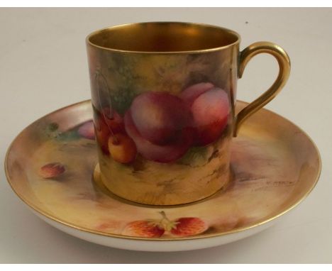 A Royal Worcester coffee can and saucer, painted to the exterior of the can and the saucer with fruit to a mossy background, 