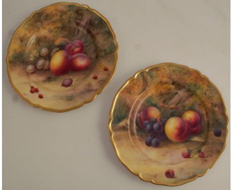 Two Royal Worcester cabinet plates, decorated with fruit to a mossy background by H H Price, both af, diameter 9ins, hair lin