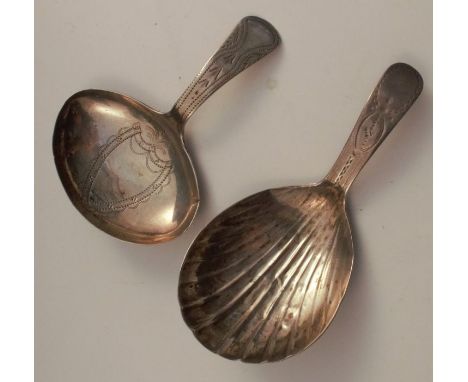 Two Georgian silver caddy spoons, one with shell bowl and engraved handle the other with engraved decoration, London 1793 and