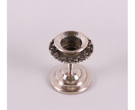 A 3rd grade 800/1000 silver 1-light candlestick with floral decor.
