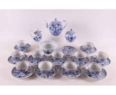 A white porcelain tea service fragment with blue Saxon decor, circa 1900, to. 28x.