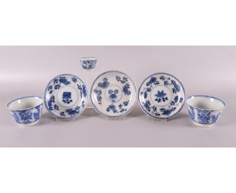 Three blue/white porcelain cups and three saucers, China, Kangxi, around 1700. Blue underglaze floral design in division. Her