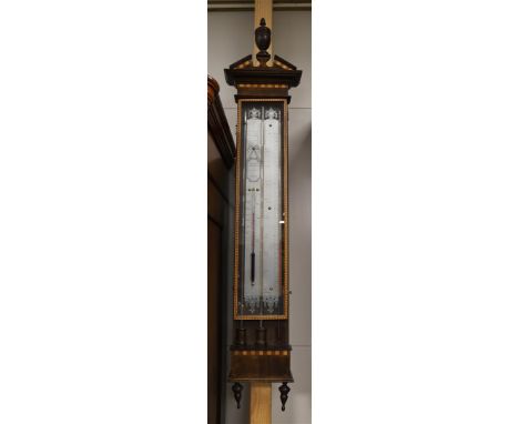 A baking barometer in mahogany case, Louis XVI style, 20th century, after an antique example, marked 'Roselli', l 136 cm.