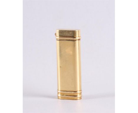 A gold-plated cigarette lighter by Cartier, Paris. Marked 'Cartier, Paris 102221' and numbered '65987', height approx. 7 cm.