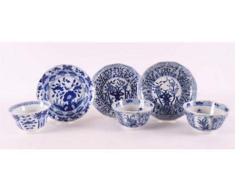Three various blue/white porcelain cups and saucers, China, 1st half of the 19th century. Blue underglaze floral decor, marke