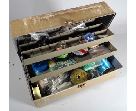 A Focus tackle/ tool box full of fly tying materials, salmon and trout hooks all unused, a Farlows rig/ cast wallet and other