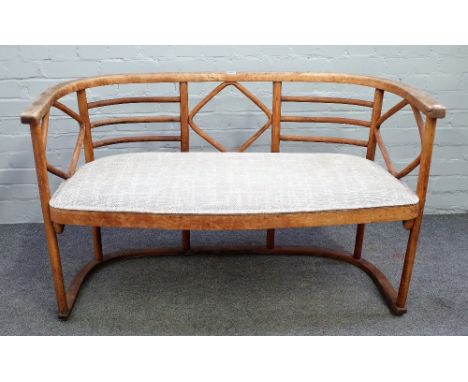 Thonet; a beech bentwood tub back sofa, 123cm wide x75cm high.