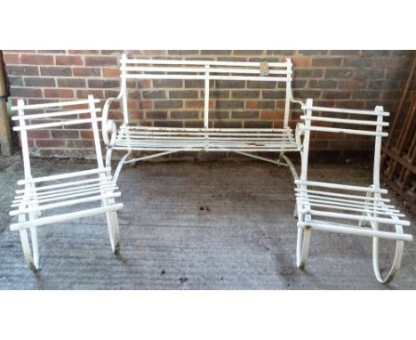 An early 20th century white painted metal slatted garden bench, 112cm wide x 76cm high and two matching chairs, 44cm wide x 7