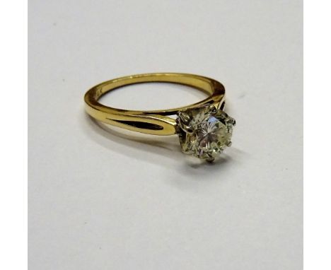 A gold and diamond single stone ring, claw set with a circular cut diamond, detailed 14 K, ring size L, gross weight 2.3 gms.