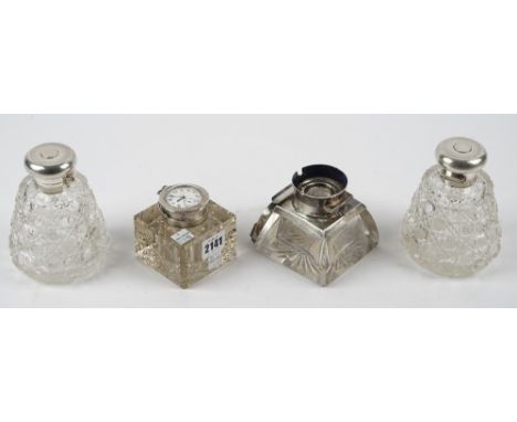 A silver mounted square glass inkwell, Birmingham 1911, the top mounted with a keyless wind, openfaced fob watch, another sil