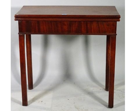 A George III mahogany foldover card table on square supports, 74cm wide x 73cm high. 