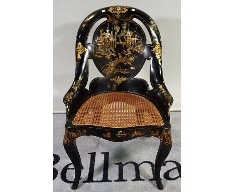 A late Victorian ebonised and mother of pearl inlaid side chair with cane seat, 57cm wide x 84cm high. 