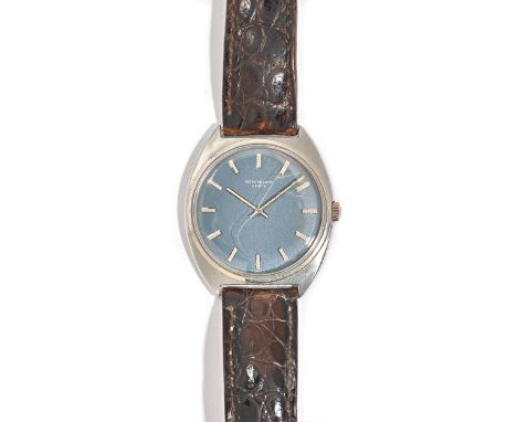 A Patek Philippe steel cased gentleman's wristwatch, the signed dark blue dial with silvered baton numerals and silvered hand
