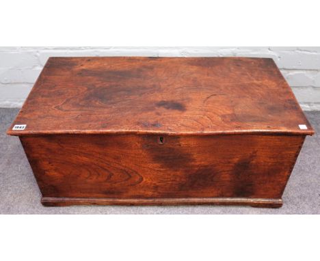 A George III elm rectangular lift top trunk, with visible dove tails, 78cm wide x 32cm high.