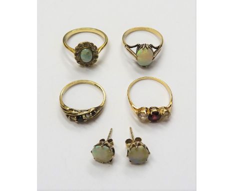 A gold ring, claw set with an oval opal, detailed 9 CT, a pair of opal single stone earstuds, a 9ct gold, sapphire and colour