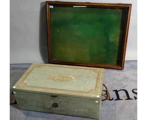 An early 20th century blue painted lift top trunk, 70cm wide x 25cm high and an early 20th century pine lift top display case