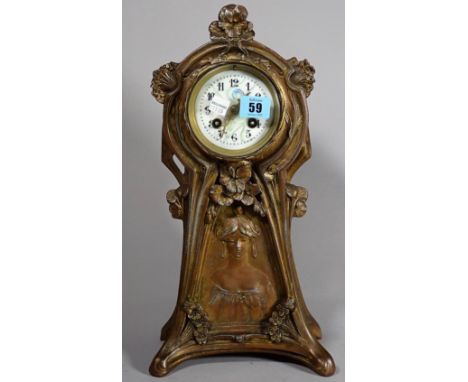 An Art Nouveau spelter mantel clock, 36cm. 