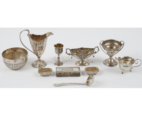 A group of silver comprising; a milk jug, Chester 1898, a Victorian bowl, with partly fluted decoration, London 1884, a Holy 