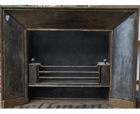 A Georgian style three bar steel fire grate and matching surround with a brass acanthus cast border, 118cm wide x 89.5cm high