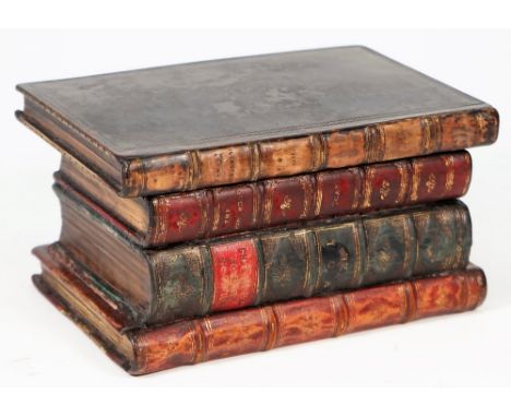 A tea caddy formed as a stack of leather bound books, 19cm wide x 10cm high.