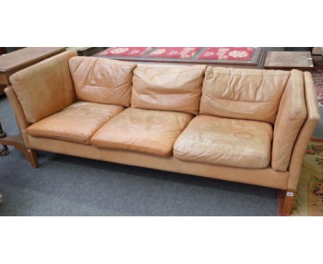 Stowey Dansk Design; a tanned leather square back three seater sofa, on block supports, 205cm wide x 65cm high.