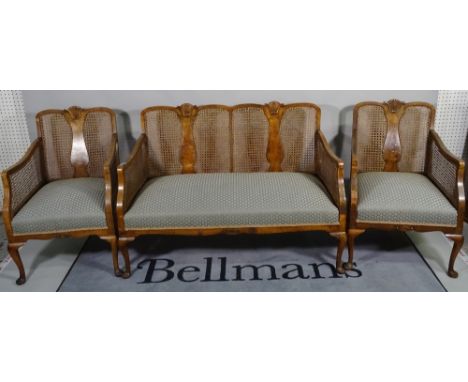 A George II style mahogany framed bergere suite comprising a two seater sofa, 126cm wide x 77cm high and  a pair of low armch