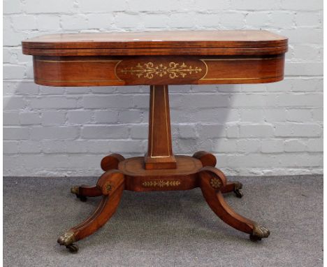 A late George III brass inlaid rosewood 'D' shaped card table on tapering square column and four downswept supports, 94cm wid