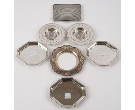 Silver, comprising; a set of four octagonal dishes, Birmingham 1932, a pair of circular Armada style dishes, commemorating Pr
