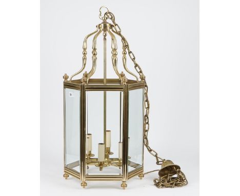 A Regency style gilt metal hall lantern of hexagonal form with internal six light fitment, 80cm high.