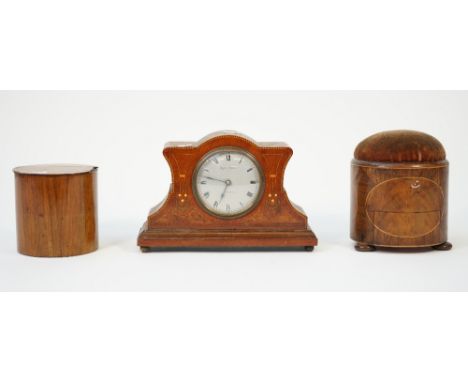 A 19th century mahogany and inlaid pin cushion of circular form with a frieze drawer and three bun feet, 15cm high, a 19th ce