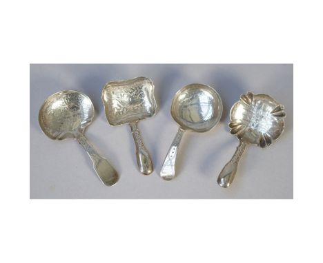 A Victorian silver tea caddy spoon, with foliate decoration to the bowl and to the handle, Birmingham 1849 and three further 
