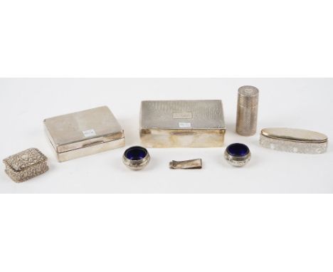 Silver and silver mounted wares, comprising; two rectangular table cigarette boxes, wooden lined within, a money clip, a shav