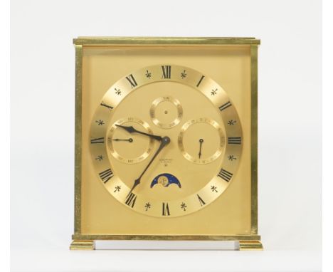 A Swiss brass "Looping" mantel clock, eight day with three subsidiary dials and moon phase aperture in a rectangular case, 18
