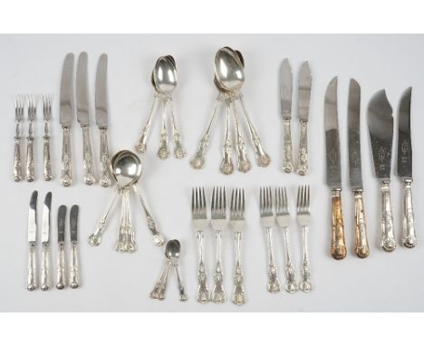 A silver King's pattern canteen of table flatware, the silver comprising all Sheffield; six tablespoons 1965, a pair of servi