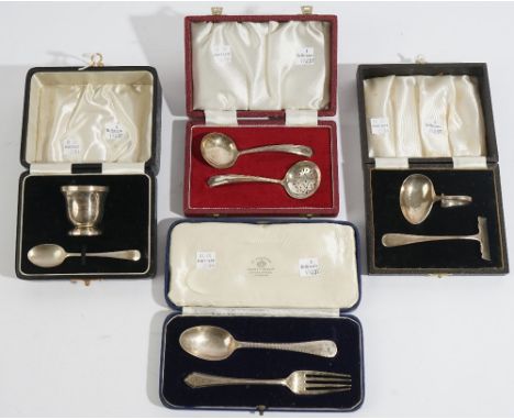 Silver, comprising; an egg cup and spoon, Birmingham 1939, a babies pusher and spoon, Chester 1938, a christening spoon and a