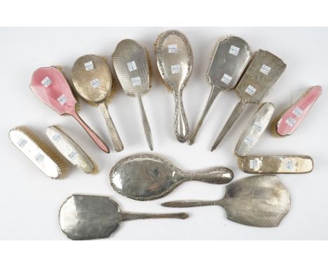 A silver and pink enamel mounted hairbrush and a matching clothes brush, Birmingham 1934 and a group of mostly silver mounted