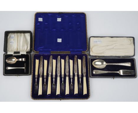 Silver and silver mounted flatware, comprising; a set of six silver bladed dessert knives, having ivory handles, Sheffield 19