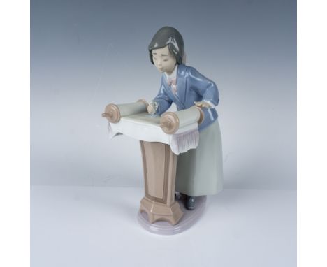 This charming Lladro porcelain figurine, titled "My Bat Mitzvah", celebrates the coming-of-age ceremony in Jewish tradition. 